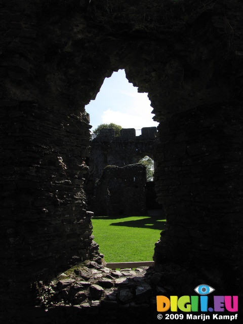 SX09362 Look through window onto courtyard Restormel Castle